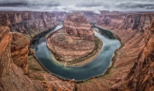 a river running through a canyon with Colorado River in the background