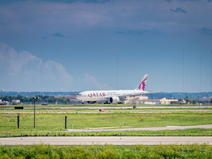 a white airplane on a runway