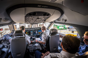 people in the cockpit of an airplane