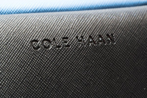 a close up of a name engraved on a fabric surface