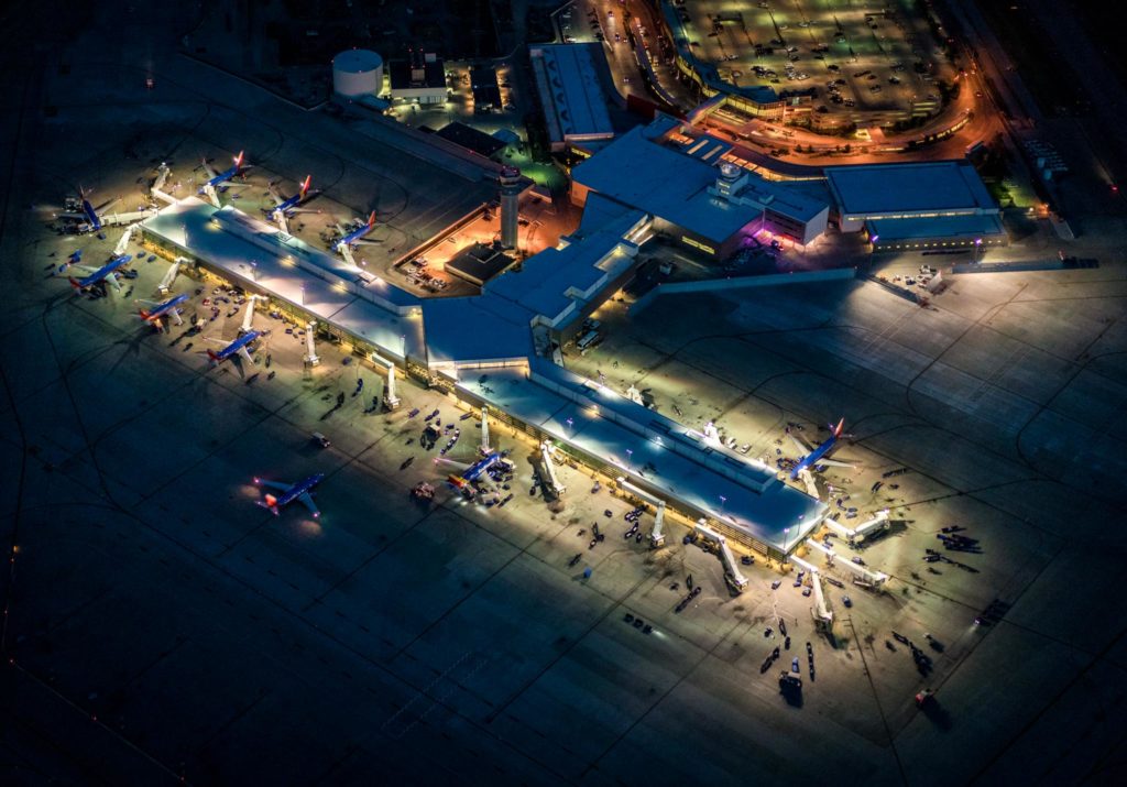 an aerial view of an airport at night