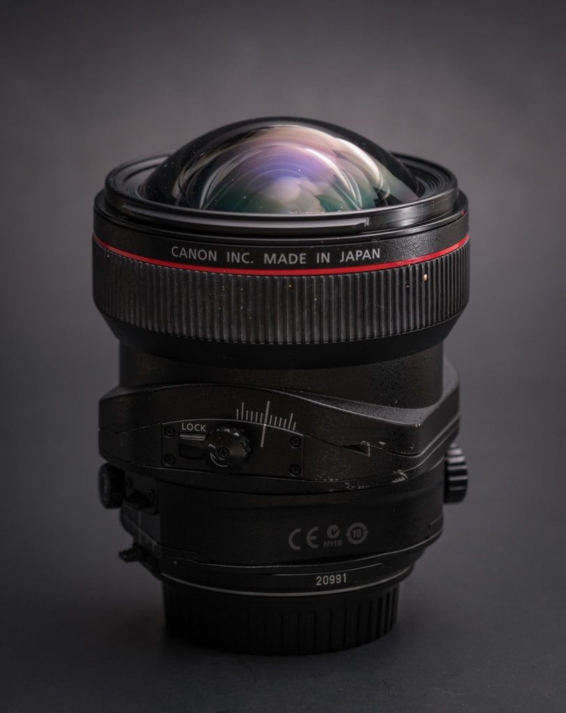 a camera lens with a red stripe