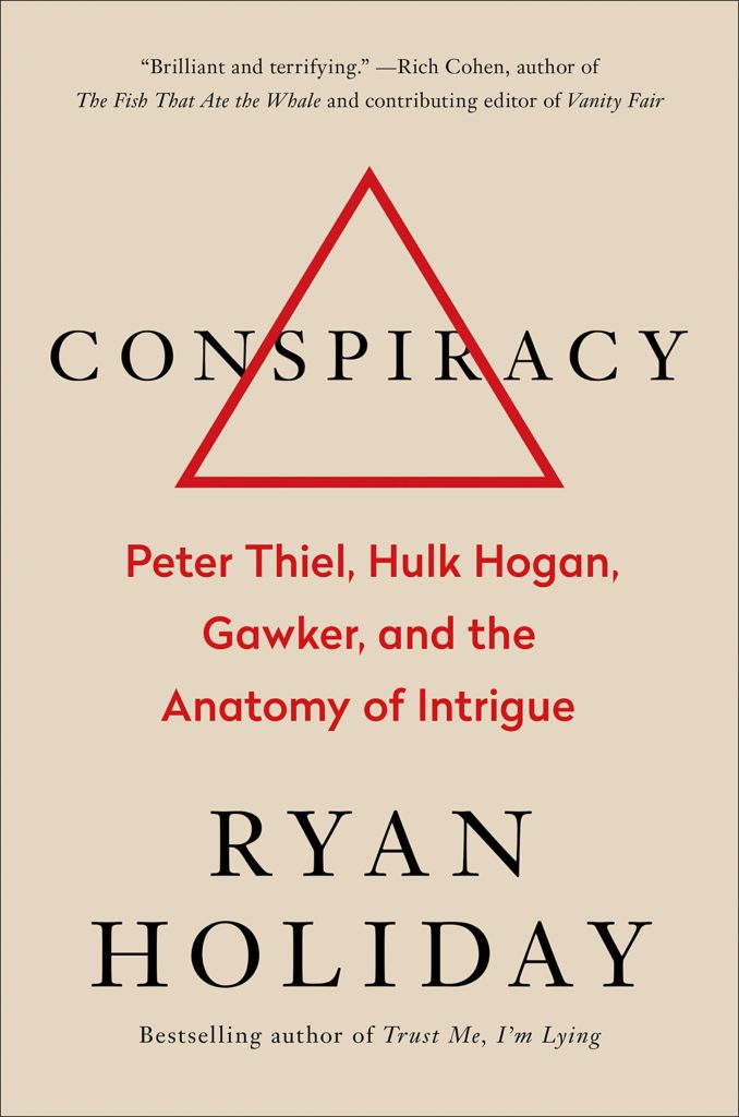 a book cover with a triangle