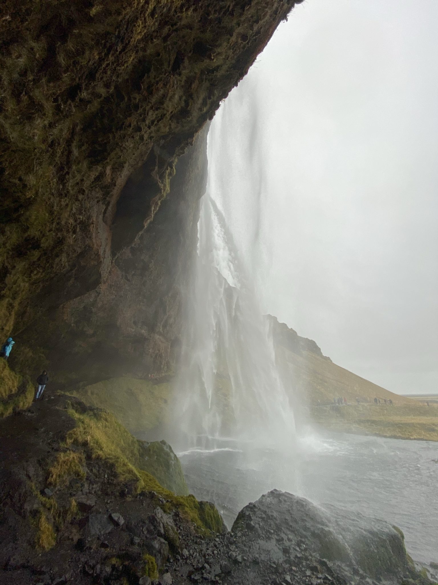 a waterfall in a cliff