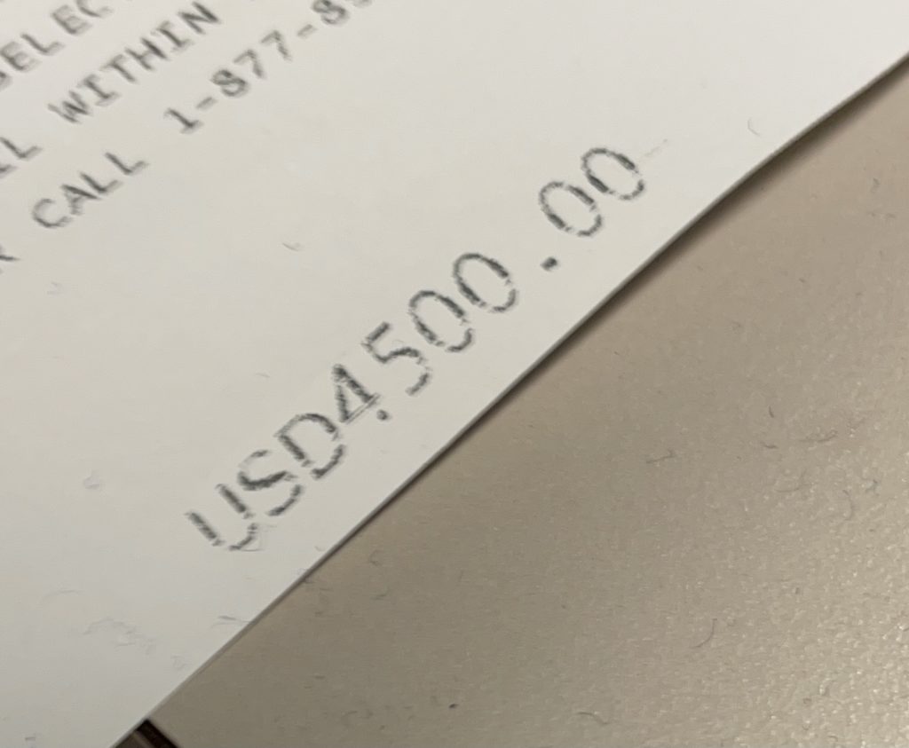 a receipt with black text on it