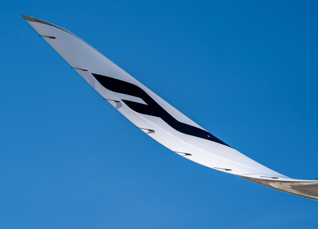 a white and black airplane wing