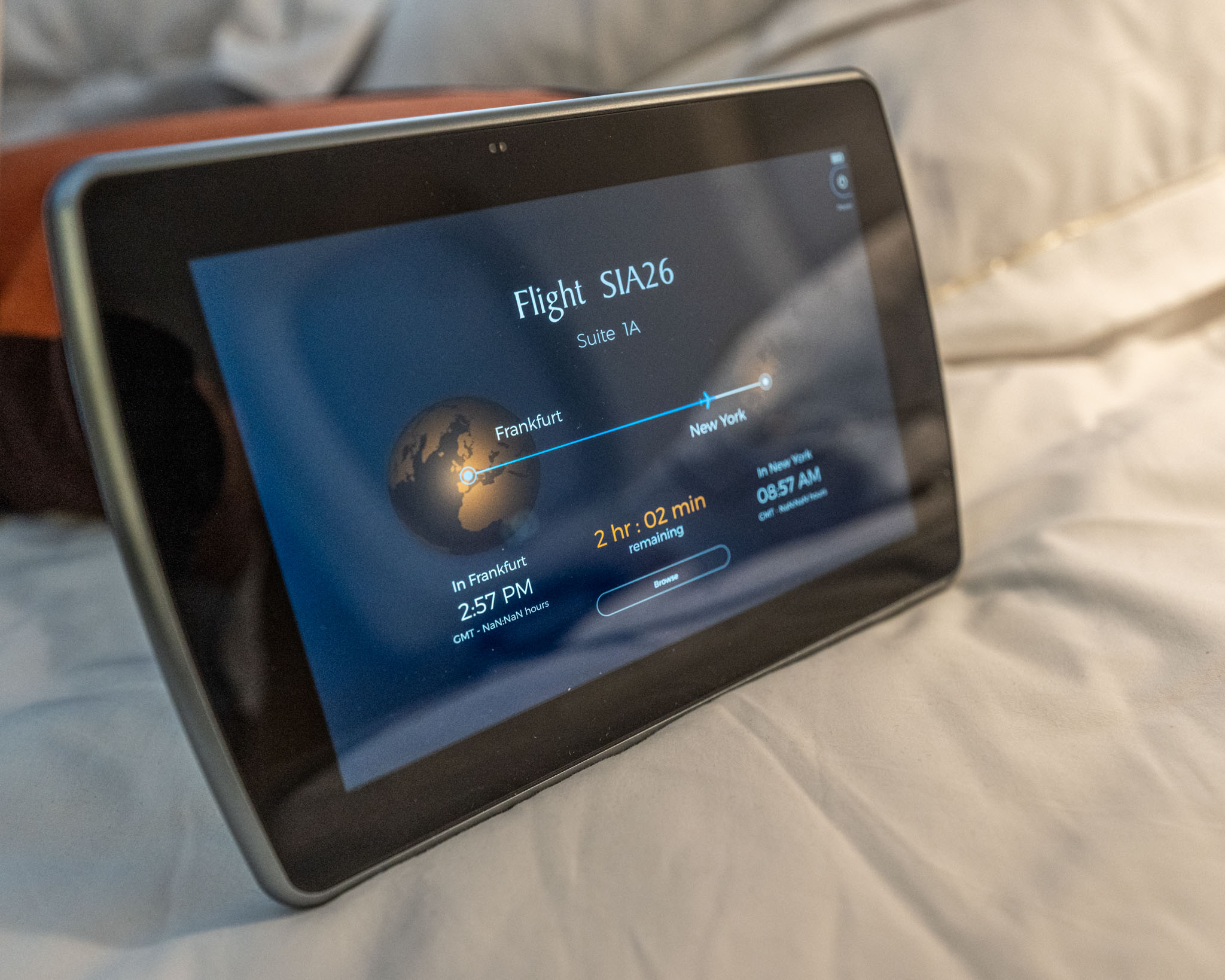 a tablet on a bed