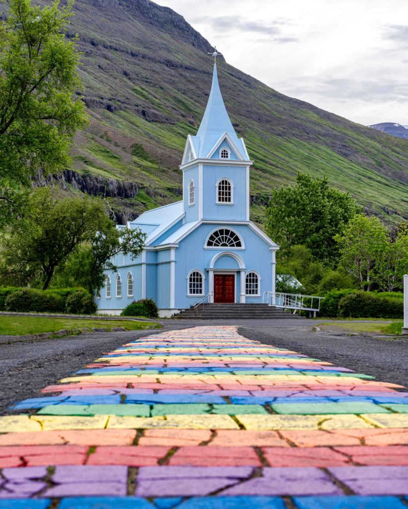 a church with a rainbow walkway
