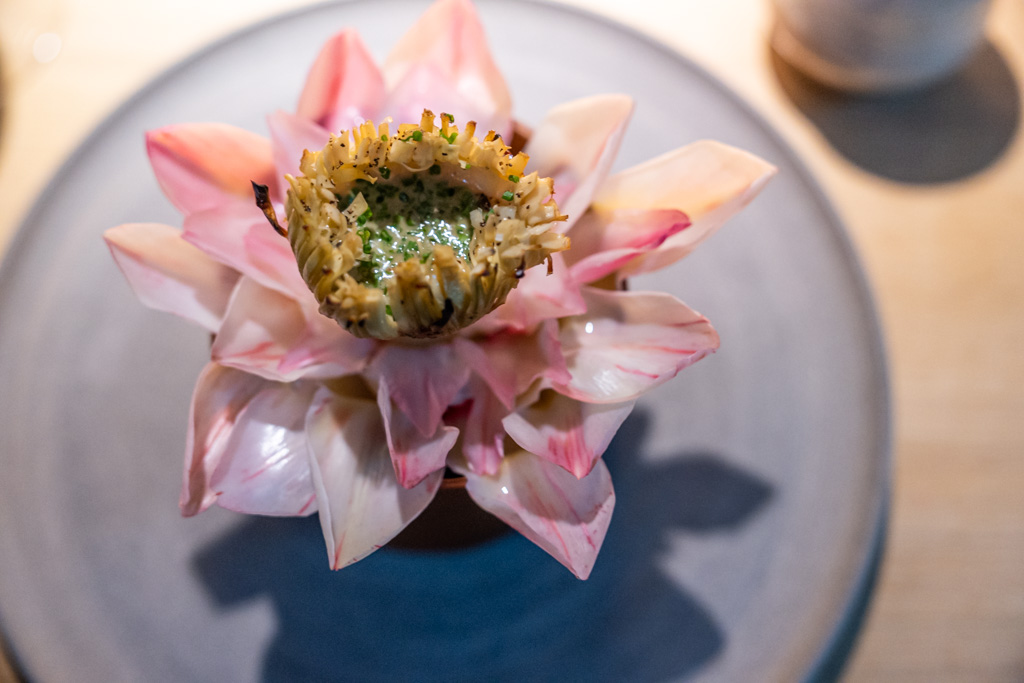 a flower shaped object on a plate