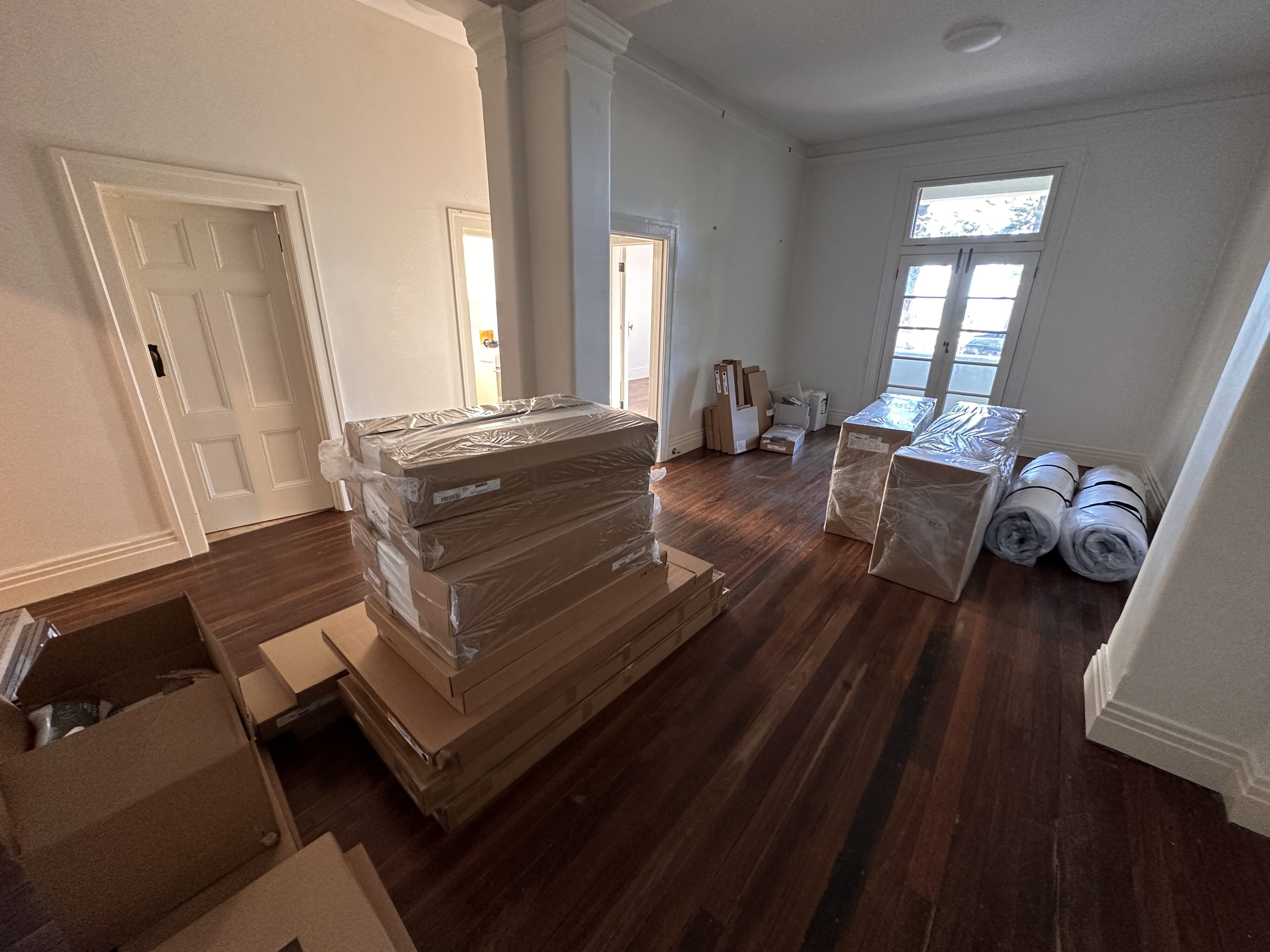 a room with boxes and cardboard boxes
