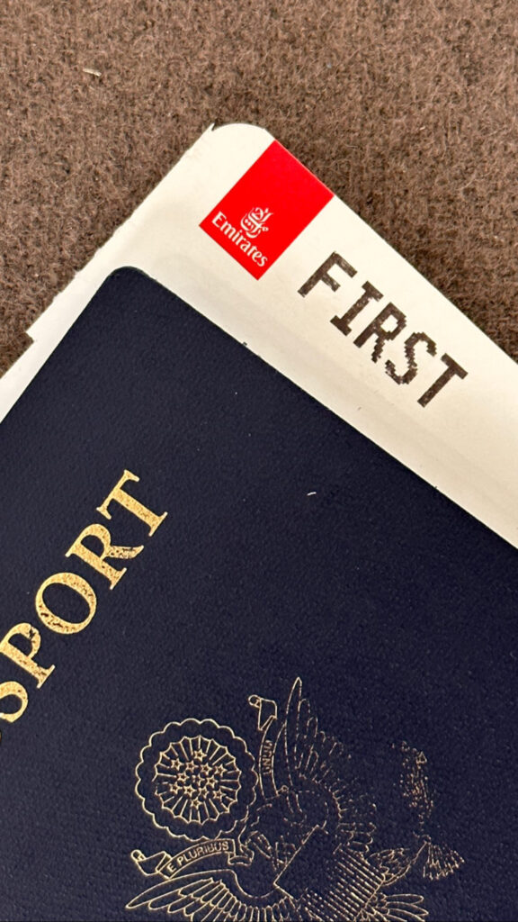 a passport with a red and white label