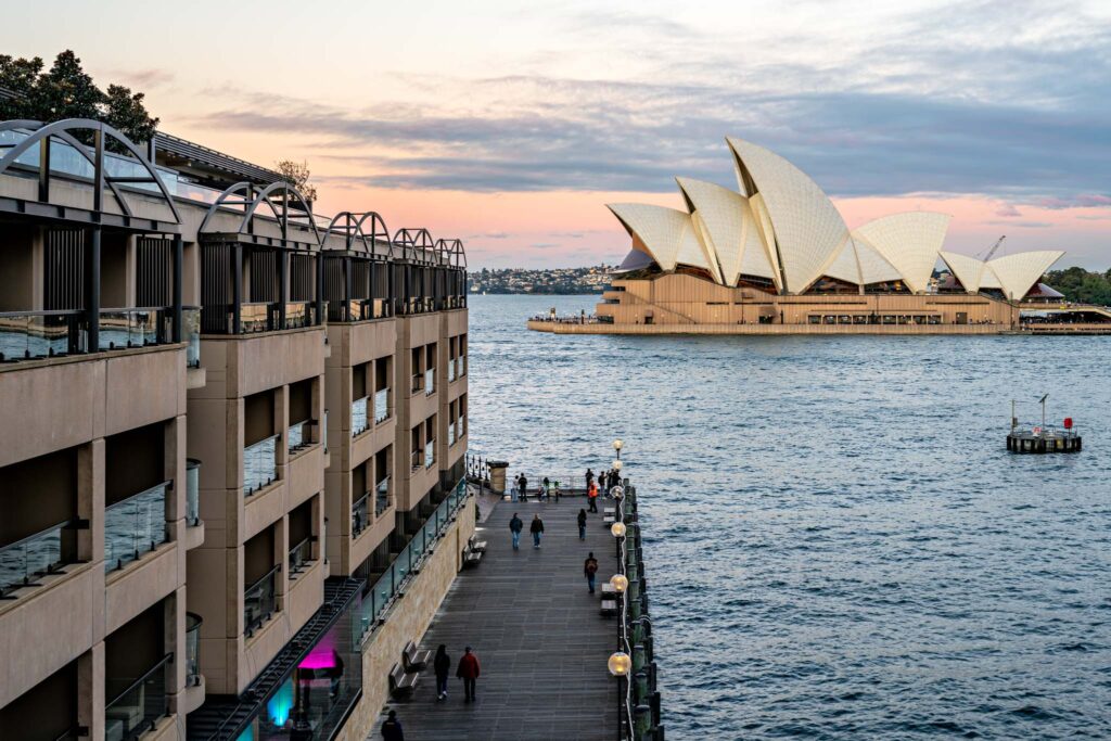 a pier with a building in the background