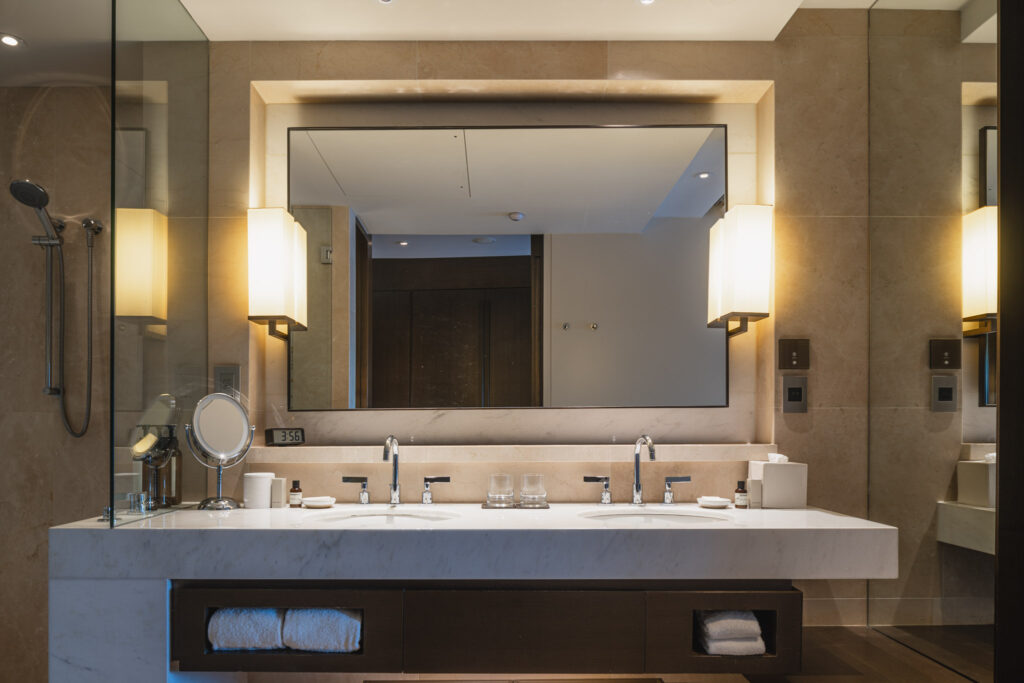 a bathroom with a large mirror