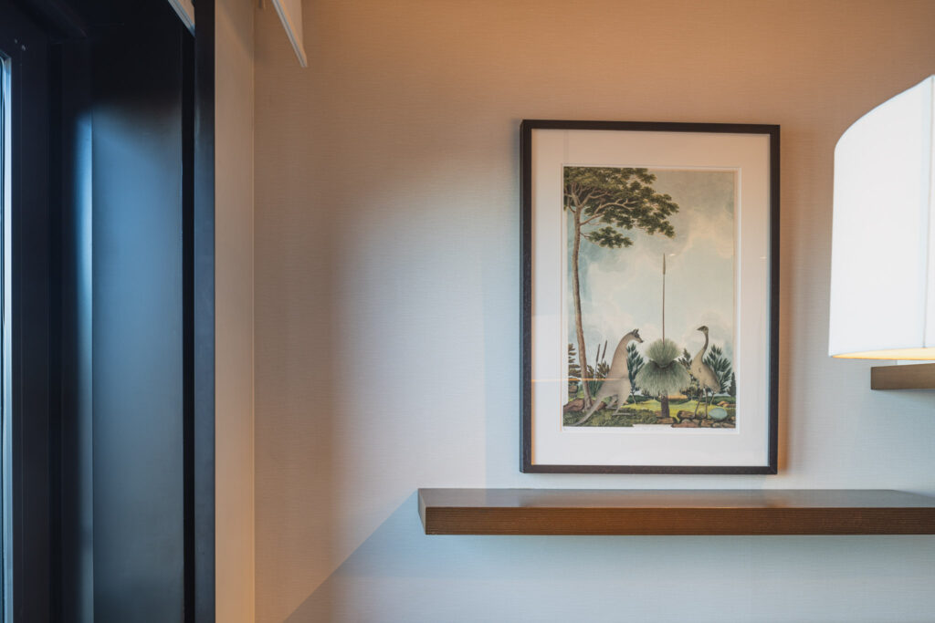 a framed picture on a wall