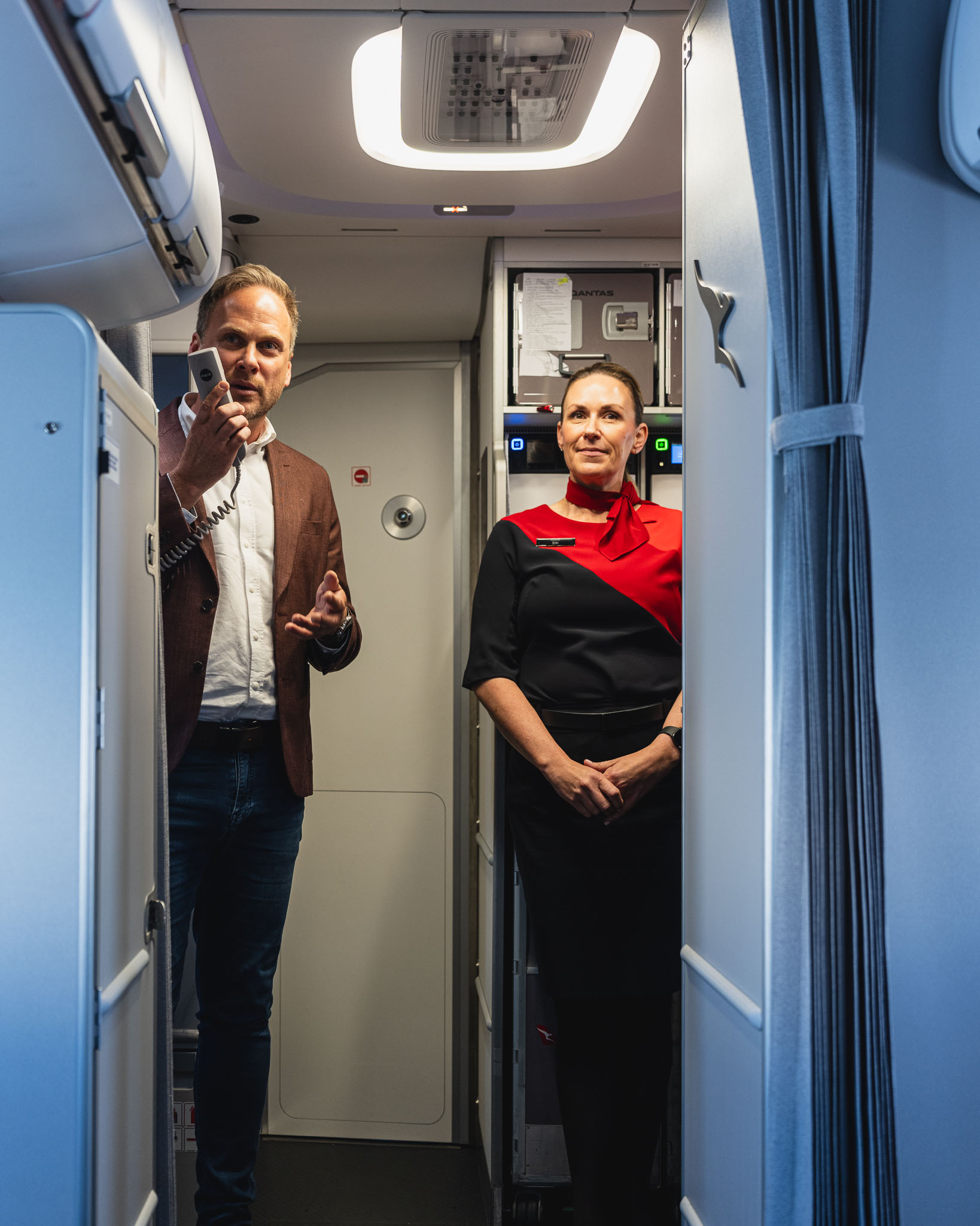 a man and woman in an airplane