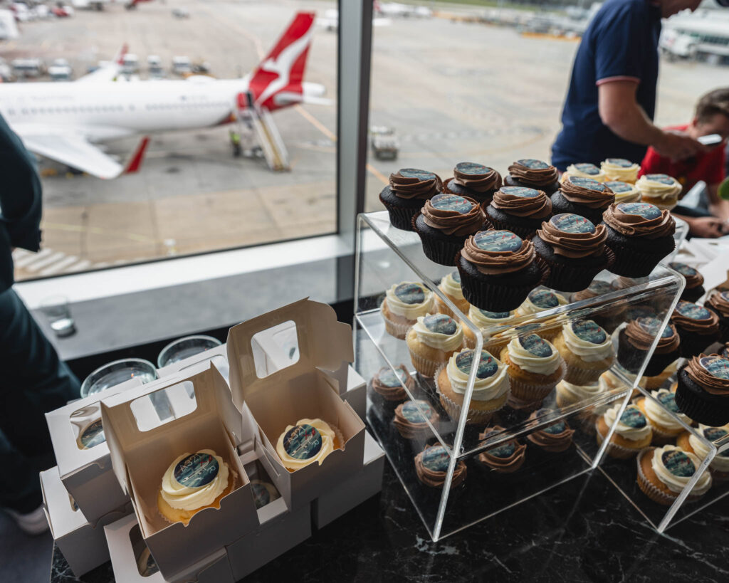 a display of cupcakes and other desserts