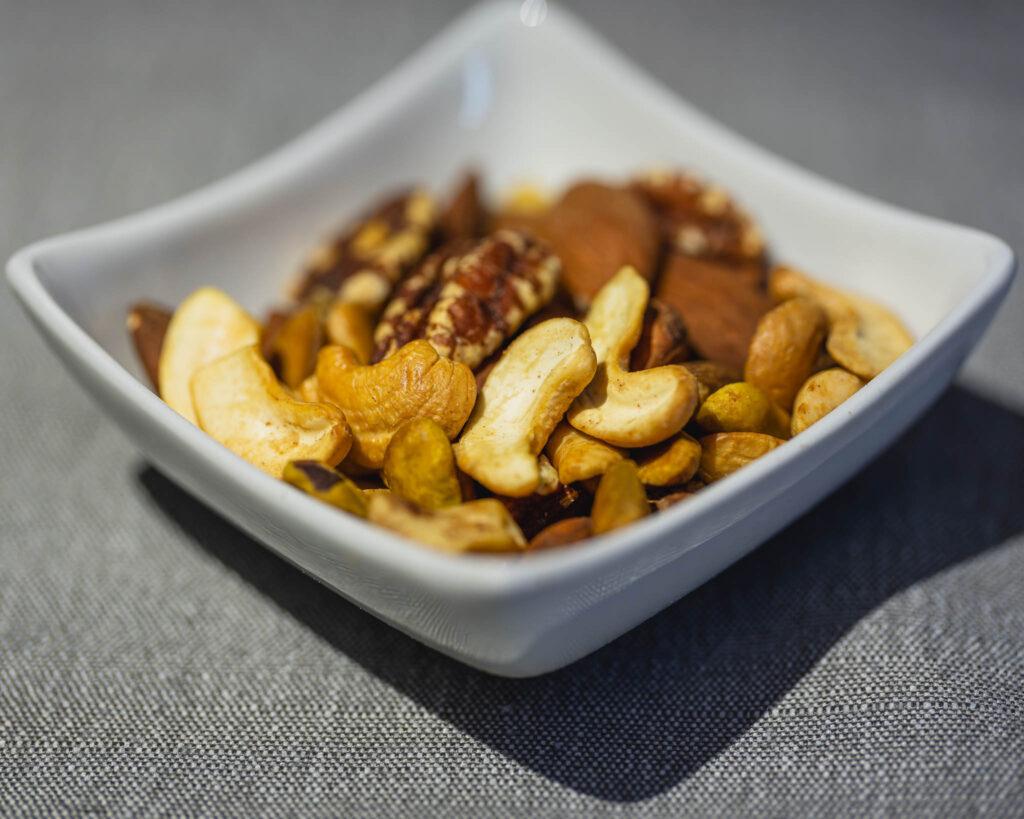 a bowl of nuts on a table