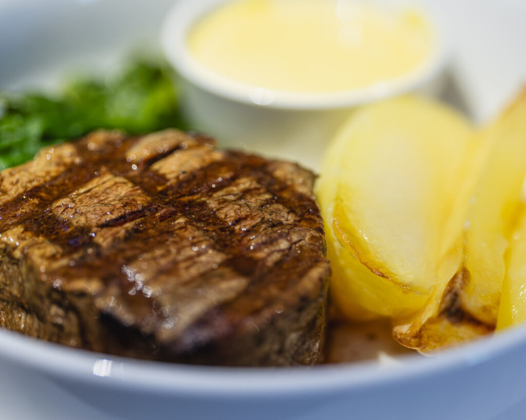 a plate of food with sauce