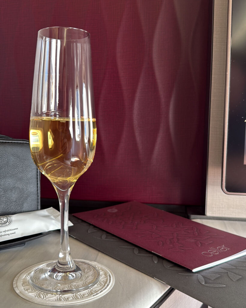 a glass of wine on a table